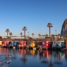 Houseboats (in La Linea, Spain) with the northern peak of Gibraltar's rock